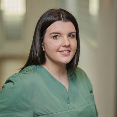 Teammitglied im Behandlungsbereich